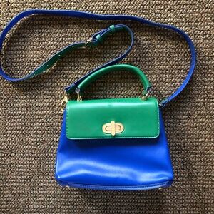 Faux leather color blocked mini satchel/cross body bag by On 34th